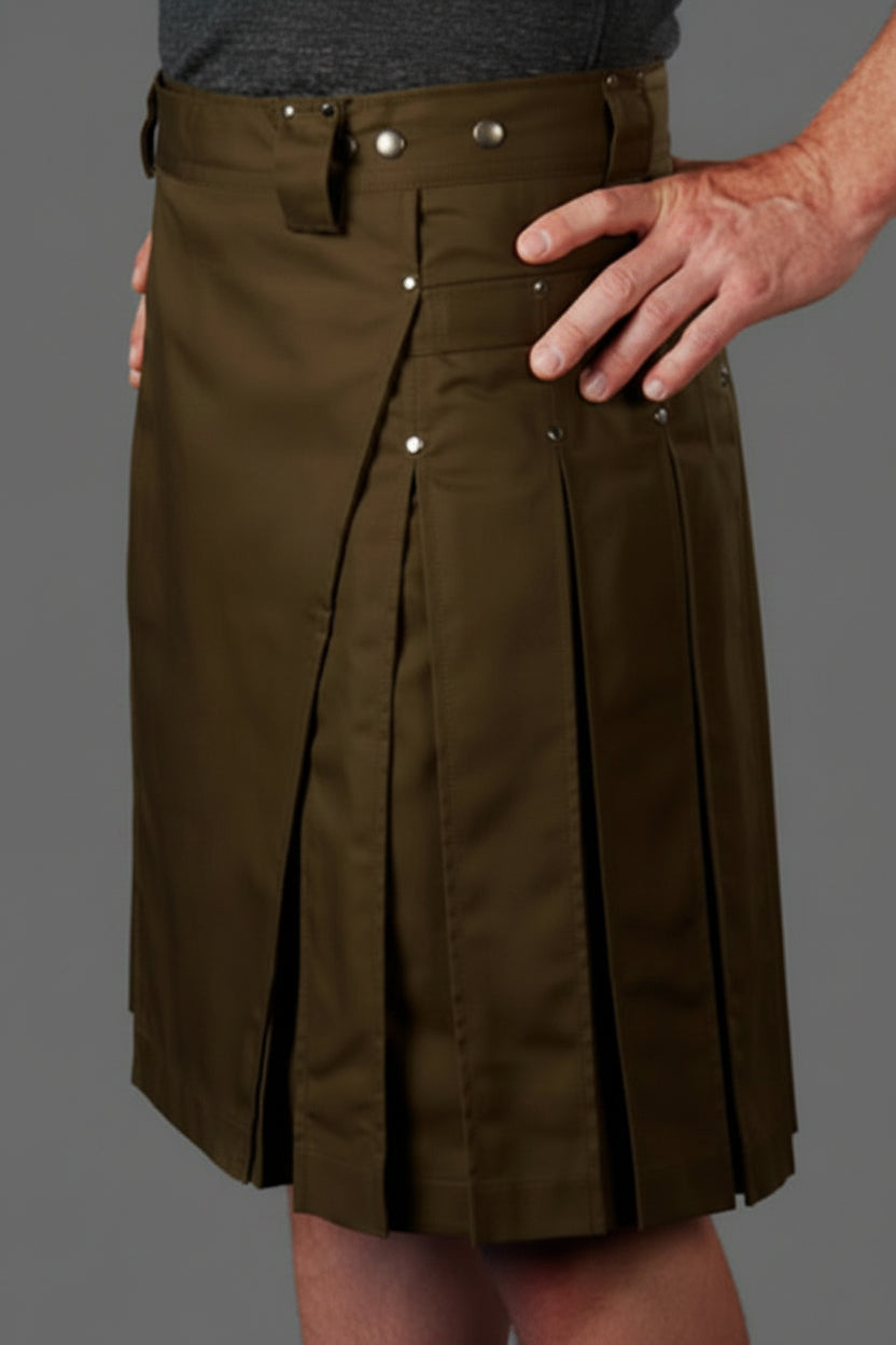 olive kilt worn by a person on a gray background