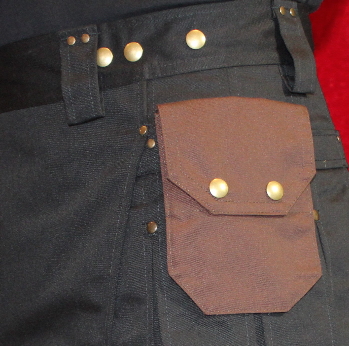 small brown attachable pocket