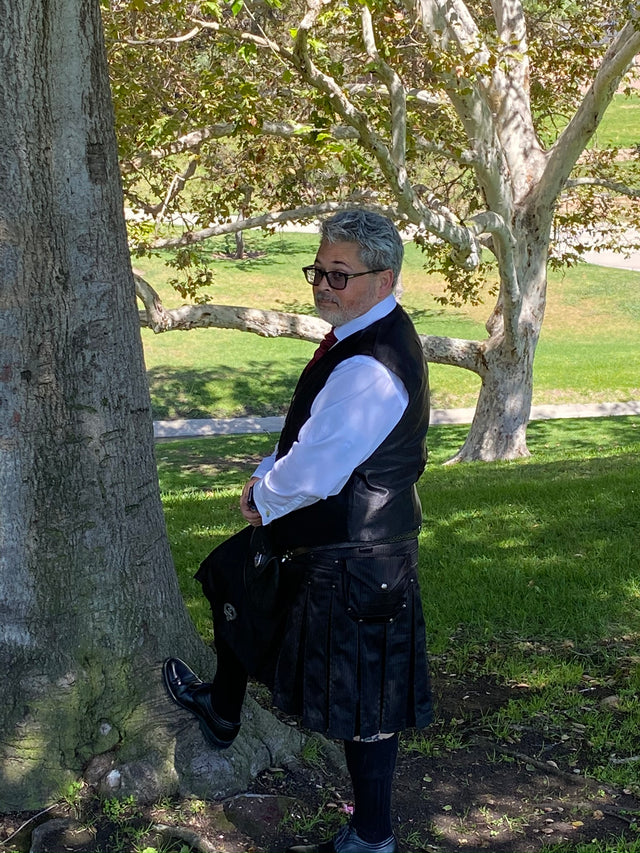 Male model in a Pinstripe Kilt with a large rivet pocket